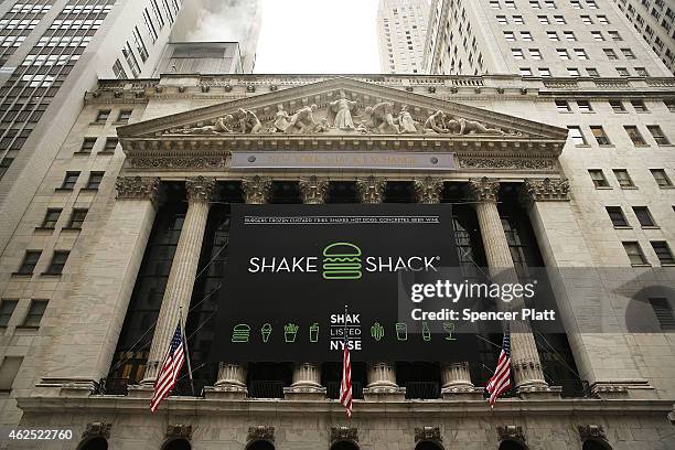 Shake Shack banner is viewed outside of the New York Stock Exchange during the burger company's IPO on January 30, 2015 in New York City. Hamburger...