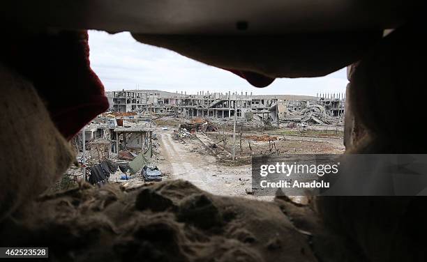 The view of damaged houses during the clashes between the Islamic State of Iraq and Levant and Kurdish armed troops in Kobane city of Syria, on...