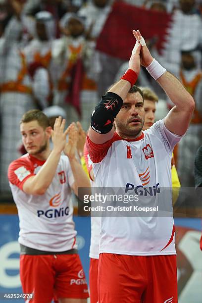 Bartosz Jurecki of Poland looks dejected after the semi final match between Poland v Qatar during the Men's Handball World Championship at Lusail...