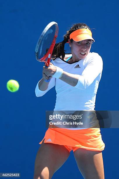 Christina McHale of the United States plays a backhand in her first round match against Yung-Jan Chan of Chinese Taipei during day two of the 2014...