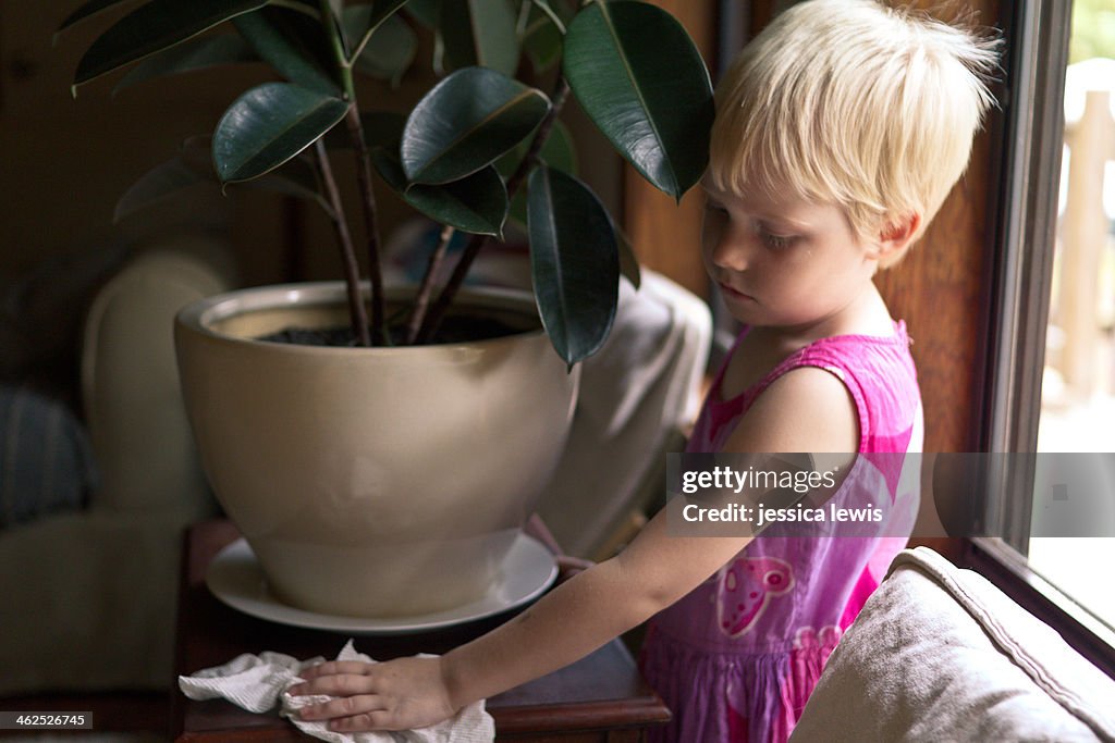 Young girl doing chores