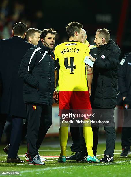 Gabriele Angella of Watford speaks to officials on the touchline after receiving a red card during the Sky Bet Championship match between AFC...