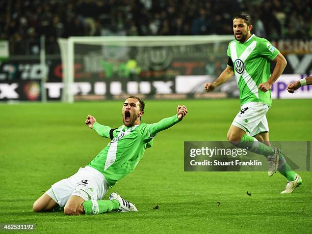 Bas Dost of Wolfsburg celebrate scoring his second goal during the Bundesliga match between VfL Wolfsburg and FC Bayern Muenchen at Volkswagen Arena...