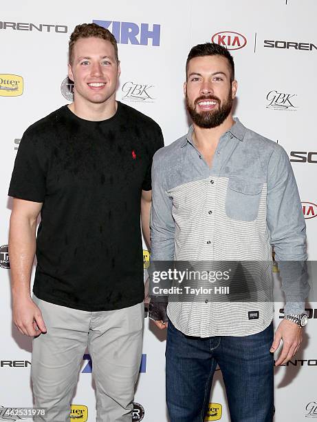 Football players Scott Solomon and Andrew Sendejo attend day one of the Kia Luxury Lounge presented by ZIRH at Scottsdale Center for Performing Arts...