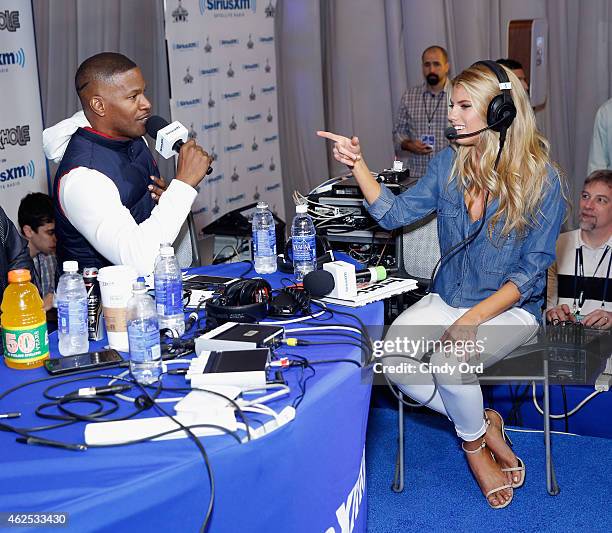 Actor/recording artist Jamie Foxx and model Charlotte McKinney attend SiriusXM at Super Bowl XLIX Radio Row at the Phoenix Convention Center on...