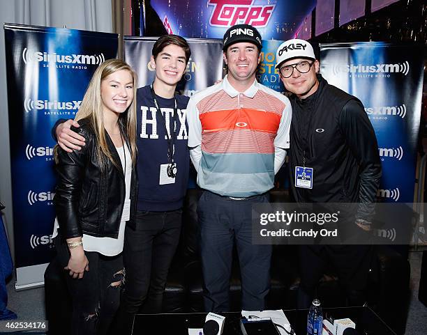 Professional golfer Bubba Watson and guests attend SiriusXM at Super Bowl XLIX Radio Row at the Phoenix Convention Center on January 30, 2015 in...