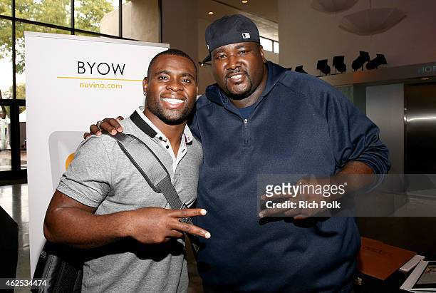 Football player Major Wright and actor Quinton Aaron attend day one of the NY Toast Gifting Suite at Scottsdale Center for Performing Arts on January...