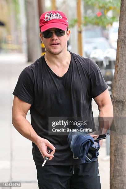 Matt Damon is seen leaving the gym wearing a New England Patriots hat, two days before the Super Bowl on January 30, 2015 in Los Angeles, California.