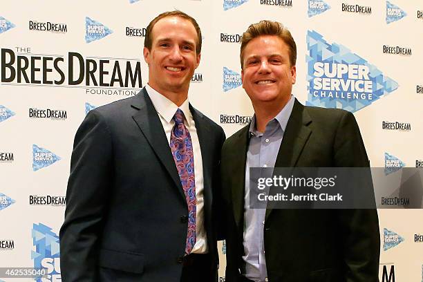 Quarterback Drew Brees and Dave Lindsey attend the Super Service Challenge Press Conference where Drew Brees Announces $1 000 Charitable Donation And...