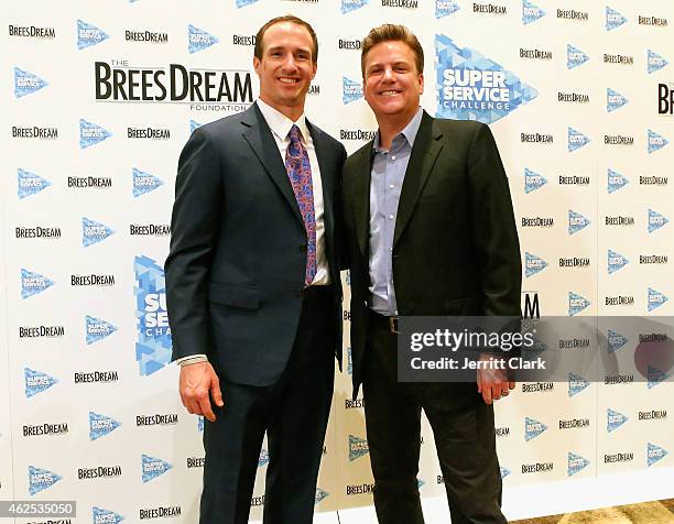 Quarterback Drew Brees and Dave Lindsey attend the Super Service Challenge Press Conference where Drew Brees Announces $1 000 Charitable Donation And...