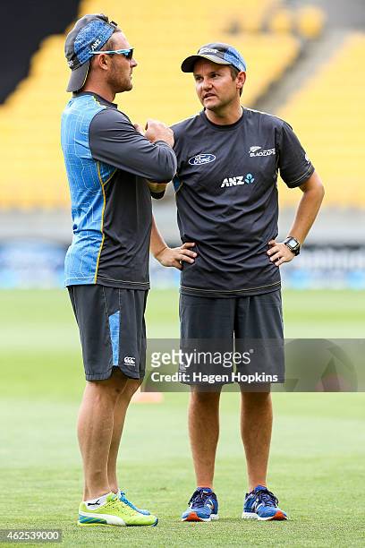 Coach Mike Hesson of New Zealand talks to capatin Brendon McCullum during the One Day International match between New Zealand and Pakistan at Westpac...