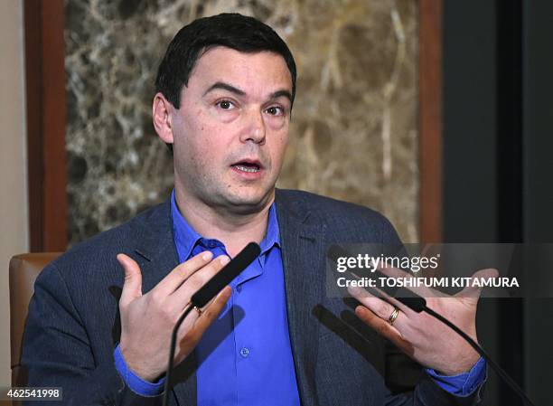 French economist Thomas Piketty answers a question during his press conference at Japan National Press Club in Tokyo on January 31 2015. Japanese...