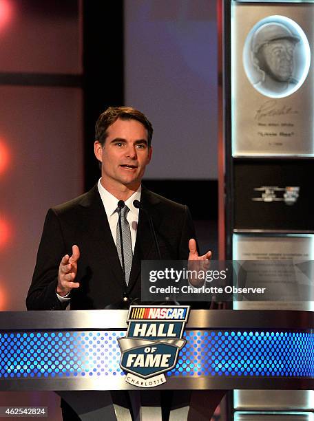 Sprint Cup Series driver Jeff Gordon gives the introduction for former NASCAR driver Wendell Scott during the NASCAR Hall of Fame Class of 2015...