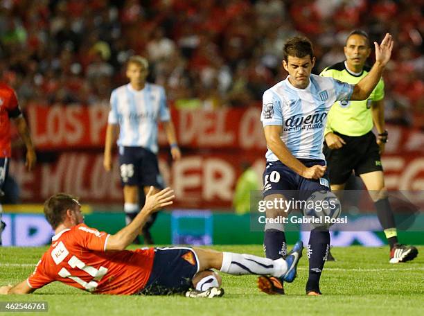 Rodrigo de Paul of Racing Club and Federico Mancuello of Independiente fight for the ball during a match between Racing Club and Independiente as...