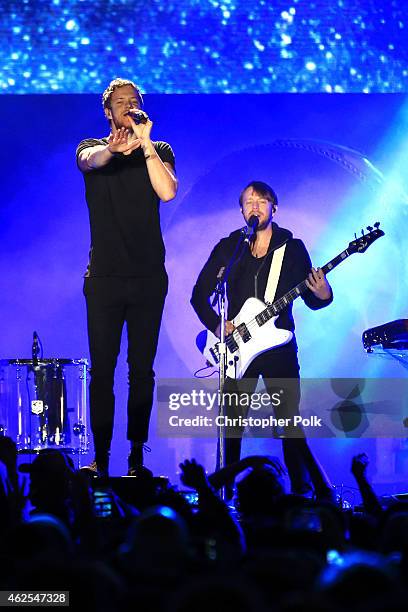 Recording artists Dan Reynolds and Ben McKee of music group Imagine Dragons performs onstage during Day 3 of the DirecTV Super Fan Festival at...