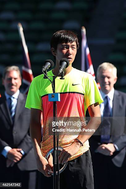 Seong-chan Hong of Korea holds the runner up trophy after his Junior Boys' Singles Final match against Roman Safiullin of Russia during the...