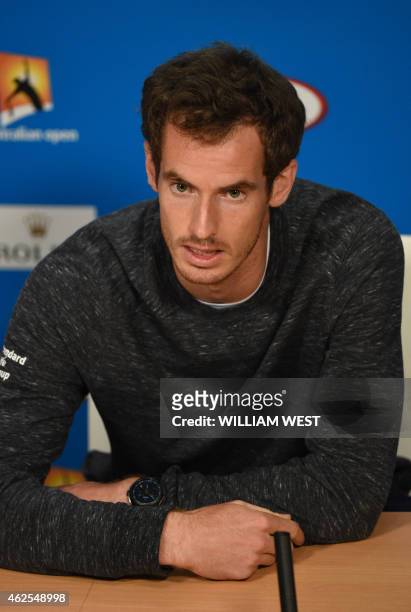 Britain's Andy Murray addresses a press conference on day thirteen of the 2015 Australian Open tennis tournament in Melbourne on January 31 ahead of...