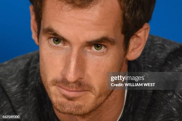 Britain's Andy Murray addresses a press conference on day thirteen of the 2015 Australian Open tennis tournament in Melbourne on January 31 ahead of...