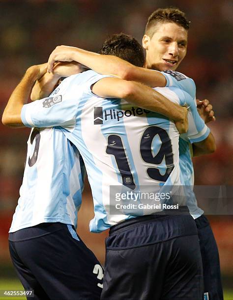 Players of Racing Club celebrate the third goal of their team scored by Valentin Viola during a match between Racing Club and Independiente as part...