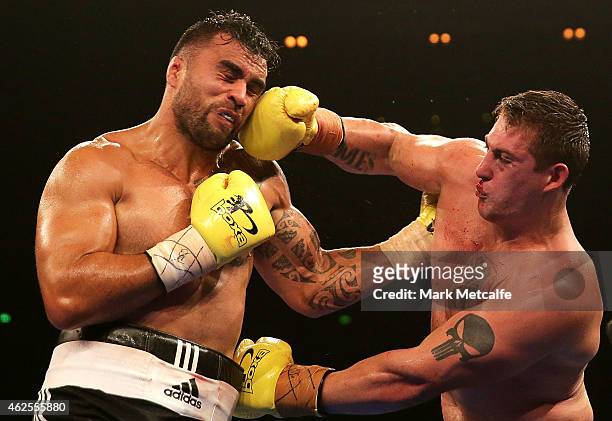 Liam Messam fights Rhys Sullivan during their heavyweight bout during the Footy Show Fight Night at Allphones Arena on January 31, 2015 in Sydney,...