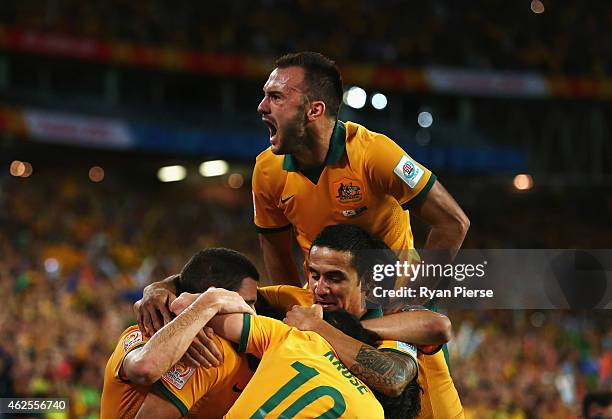 Ivan Franjic of Australia celebrates after Massimo Luongo of Australia scored his teams first goal during the 2015 Asian Cup final match between...