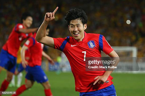Son Heung Min of Korea Republic celebrates scoring an injury time goal to level the scores during the 2015 Asian Cup final match between Korea...