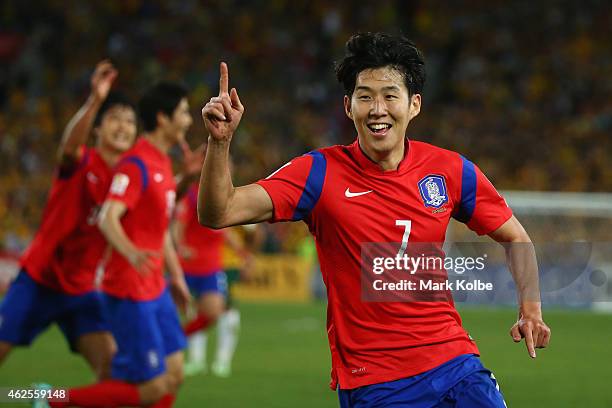 Son Heung Min of Korea Republic celebrates scoring an injury time goal to level the scores during the 2015 Asian Cup final match between Korea...