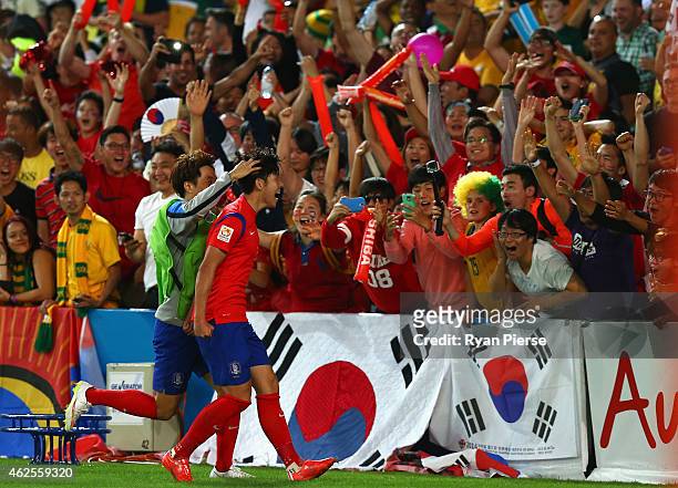 Son Heung Min of Korea Republic celebrates after scoring his teams first goal during the 2015 Asian Cup final match between Korea Republic and the...