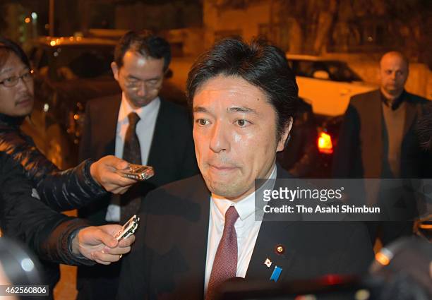 Japanese Vice Foreign Minister Yasuhide Nakayama speaks to media reporters outside the Japanese Embassy on January 30, 2015 in Amman, Jordan....