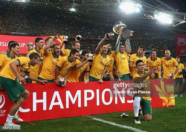 Massimo Luongo of Australia talkes a selfie as Australia celebrate during the 2015 Asian Cup final match between Korea Republic and the Australian...