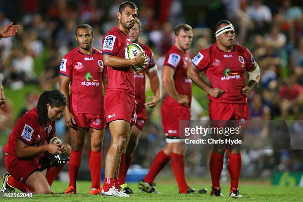 Karmichael Hunt of the Reds waits to kick during the Super Rugby trial match between the Queensland Reds and the Melbourne Rebels at Barlow Park on...