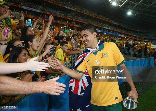 Massimo Luongo of Australia celebrates after the 2015 Asian Cup final match between Korea Republic and the Australian Socceroos at ANZ Stadium on...