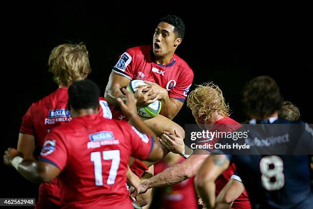 Jamie-Jerry Taulagi of the Reds takes a high ball during the Super Rugby trial match between the Queensland Reds and the Melbourne Rebels at Barlow...