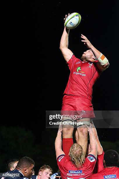 Marco Kotze of the Reds takes a lineout during the Super Rugby trial match between the Queensland Reds and the Melbourne Rebels at Barlow Park on...