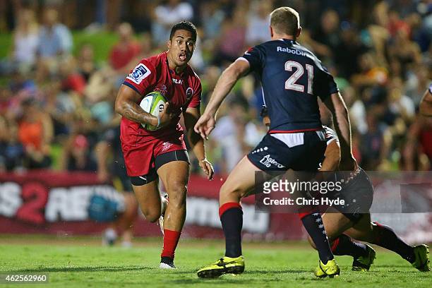 Jamie-Jerry Taulagi of the Reds runs the ball during the Super Rugby trial match between the Queensland Reds and the Melbourne Rebels at Barlow Park...