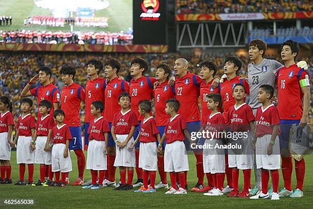 South Korean team sing their National Anthem during the 2015 Asia Cup Final between Australia Vs South Korea in the 2015 AFC Asian Cup match, at the...