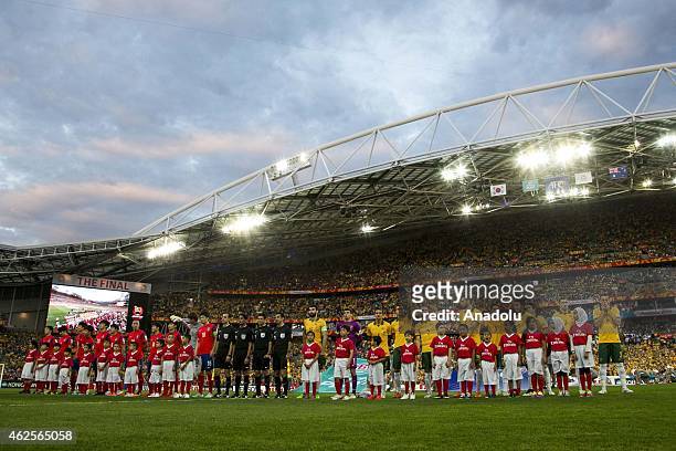 The Korean and Australian side line up before the National Anthems during the 2015 Asia Cup Final between Australia Vs South Korea in the 2015 AFC...