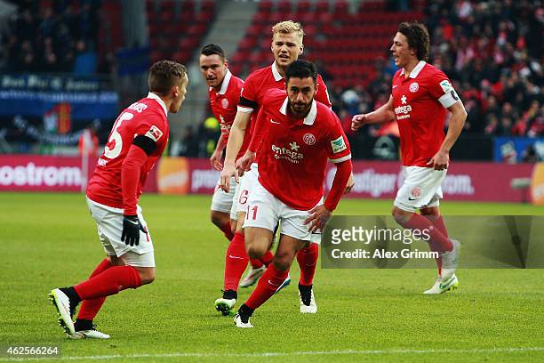 Yunus Malli celebrates his team's first goal with team mates during the Bundesliga match between 1. FSV Mainz 05 and SC Paderborn at Coface Arena on...