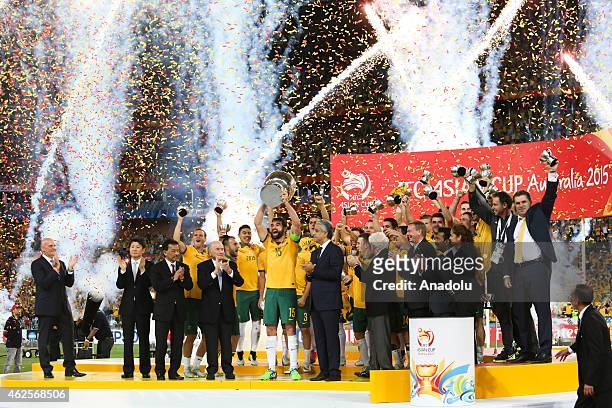 Australian team celebrates after the 2015 Asia Cup Final between Australia Vs South Korea in the 2015 AFC Asian Cup match at the Stadium Australia on...