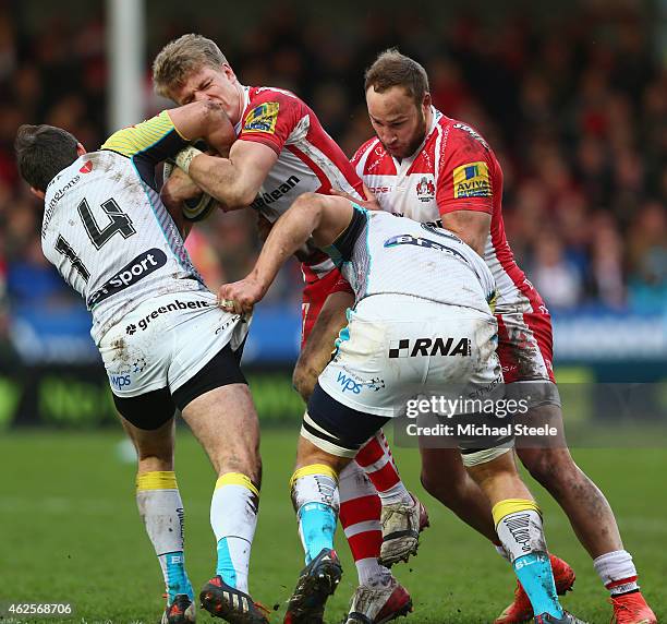 Steph Reynolds of Gloucester receives an elbow to the face afrom Tom Grabham of Ospreys during the LV=Cup match between Gloucester Rugby and Ospreys...
