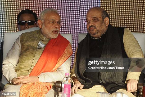 Prime Minister Narendra Modi and BJP president Amit Shah during an election rally at Karkardooma on January 31, 2015 in New Delhi, India. Modi...