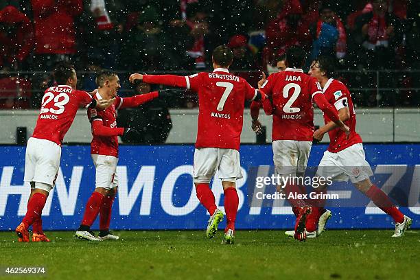 Pablo de Blasis of Mainz celebrates his team's third goal with team mates during the Bundesliga match between 1. FSV Mainz 05 and SC Paderborn at...