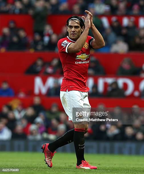 Radamel Falcao of Manchester United applauds the fans after being substituted during the Barclays Premier League match between Manchester United and...