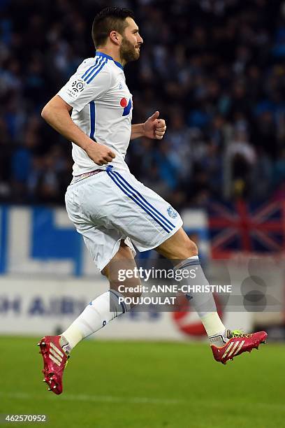 Marseille's French forward Andre-Pierre Gignac celebrates after scoring a goal during the French L1 football match between Marseille and Evian Thonon...