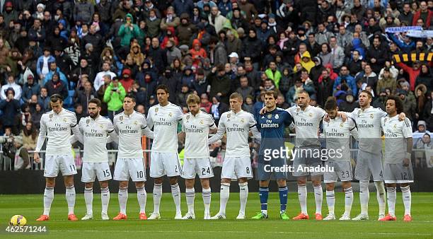 Players of Real Madrid sing national anthem ahead of the La Liga soccer match between Real Madrid CF and Real Sociedad de Futbol at Estadio Santiago...