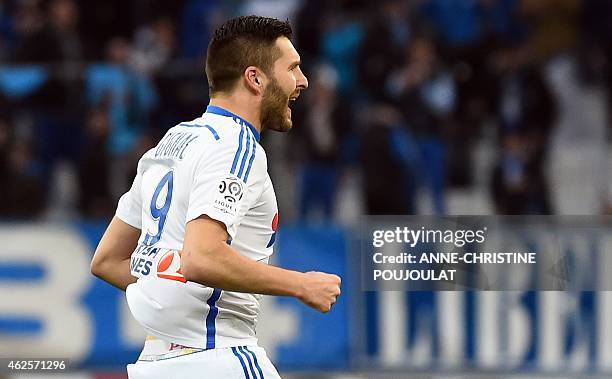 Marseille's French forward Andre-Pierre Gignac reacts after scoring a goal during the French L1 football match between Marseille and Evian Thonon...