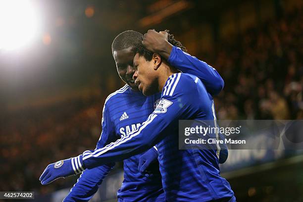 Loic Remy of Chelsea celebrates scoring the opening goal with Kurt Zouma of Chelsea during the Barclays Premier League match between Chelsea and...