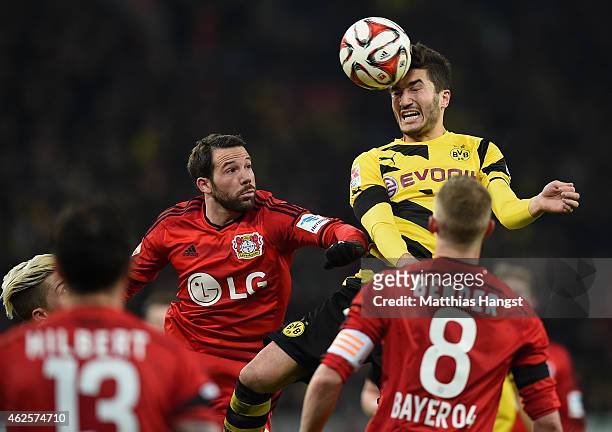 Gonzalo Castro of Leverkusen jumps for a header with Nuri Sahin of Dortmund during the Bundesliga match between Bayer 04 Leverkusen and Borussia...