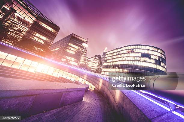 london office buildings by night - guildhall london stock pictures, royalty-free photos & images