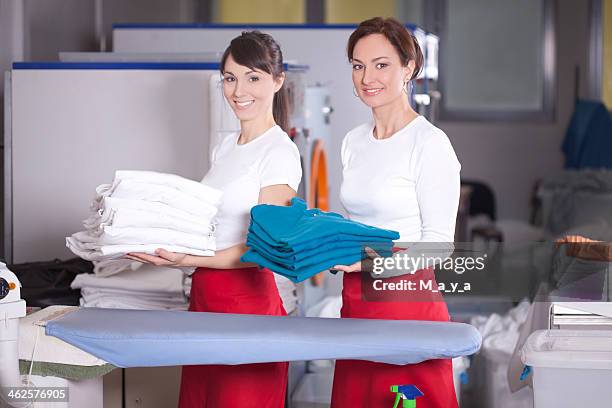 service for laundry and ironing. - washing mashine stock pictures, royalty-free photos & images